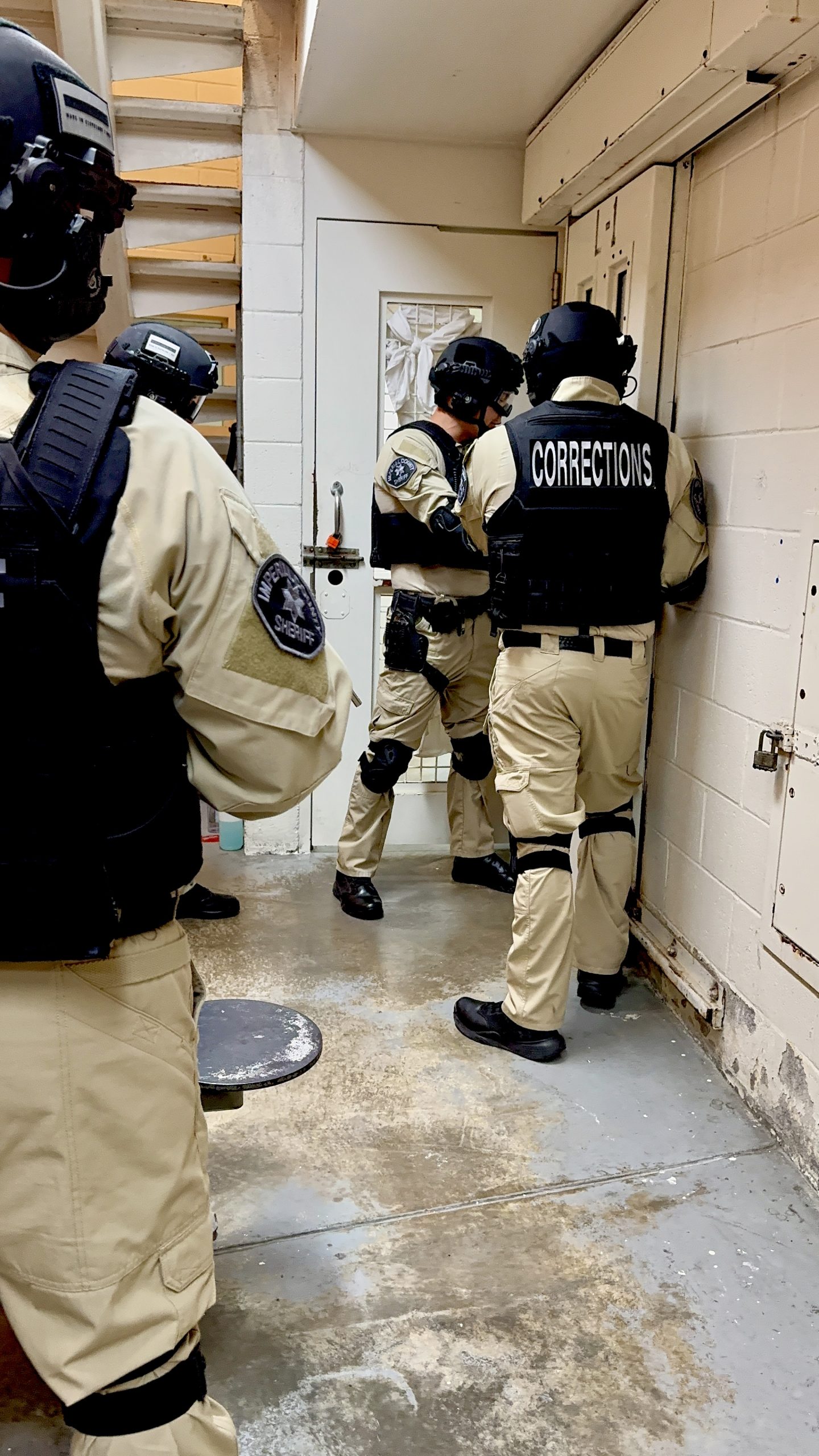 Imperial County Sheriff's Corrections Special Operations Response Team (C-SORT) member with less-lethal launcher during training