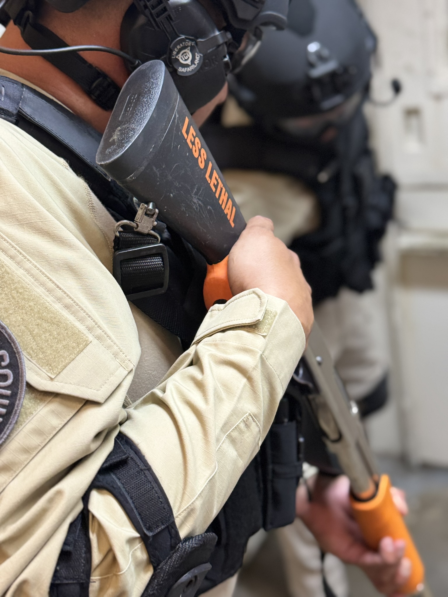 C-SORT team stacked at a cell door during a coordinated response drill